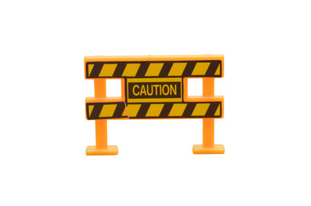 Construction Sign: A bright orange CAUTION barrier, an accessory for a model set, shown on a plain...