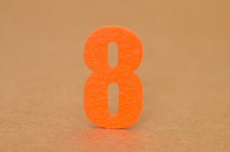 Focus on Eight: A simple, graphic image of the numeral 8, perfect for educational materials, flashcards, textbooks, and lessons on basic arithmeticの写真素材