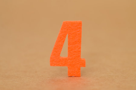 ocus on Four: A Basic Math Concept. This clear, close-up image of the number "4" is perfect for teaching materials, lessons, and educational content.の写真素材