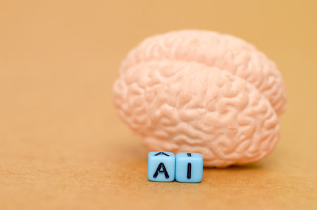 The New Intelligence: A powerful conceptual image contrasting "AI" blocks with the human brain, representing the rise of artificial intelligence.の写真素材