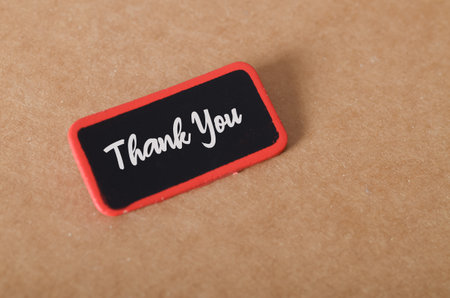 the phrase "Thank You" is written in white, a simple message to convey gratitude effectively.の写真素材