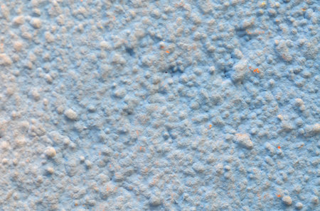 Soft Blue Matte Finish with Bumpy, Uneven Stucco Relief for Construction and Design Backgrounds.の写真素材