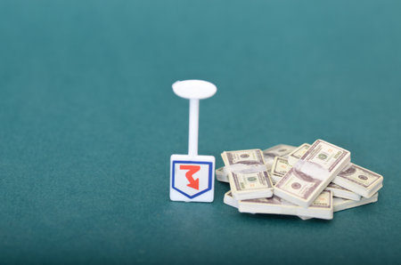 Economic Downturn: Arrow Piercing Money Stacks Symbolizing Asset Devaluation and Loss