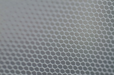 Textile Backgrounds with Honeycomb Mesh Hexagonal Patterns and Natural Weavesの写真素材