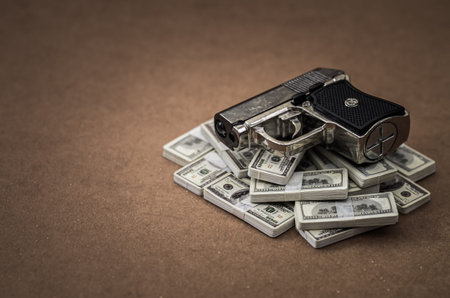 Weapon and Currency Composition Illustrating Illicit Power Struggles and Economic Interests