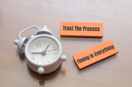 Motivational Concept of Success Progress with Clock Symbolizing Patient Achievementの写真素材
