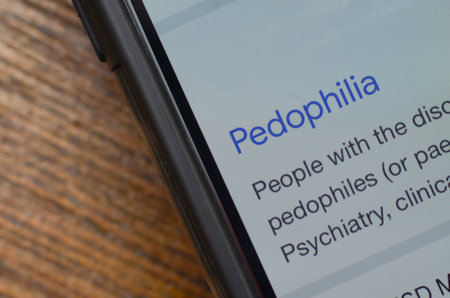 Educational Information on Pedophilia Displayed on Smartphone Screen