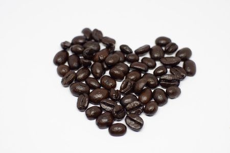 Coffee beans heart isolated on white background close up - Imageの写真素材