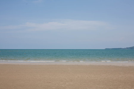 Beach with clear sea on a relaxing day. Suitable as a background for travel.の写真素材