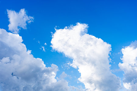 Cloudy blue sky abstract background, blue sky background with tiny clouds, blue sky background with...