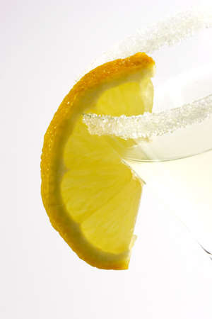 Close up of a margarita with lemon slice in a glassの写真素材