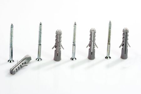 Screws and Dowels on bright Backgroundの写真素材