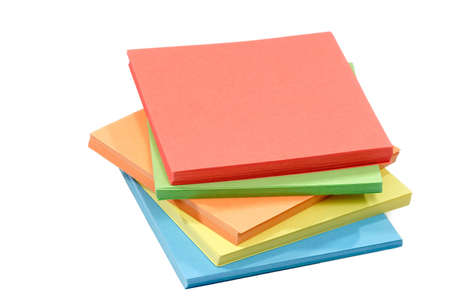 Batch of assorted color paper over white background