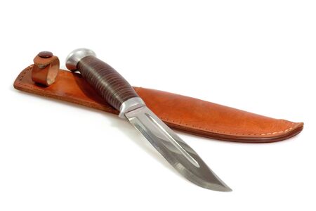 Closeup of a hunting knife on bright background.の写真素材