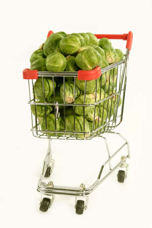 Brussels sprouts in a shopping trolley on white  backgroundの写真素材