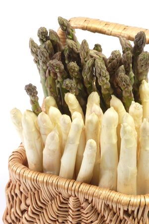 Basket with white and green asparagus - isolated on white backgroundの写真素材