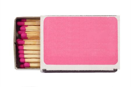 Matches in a matchbox on a white background with copy spaceの写真素材