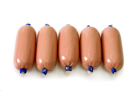 Little pork sausage on bright background