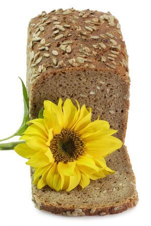 Sliced multi-grain-bread with sunflower on white backgroundの写真素材