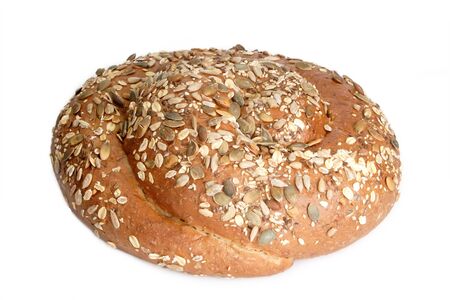 Bread with different seeds on white background.