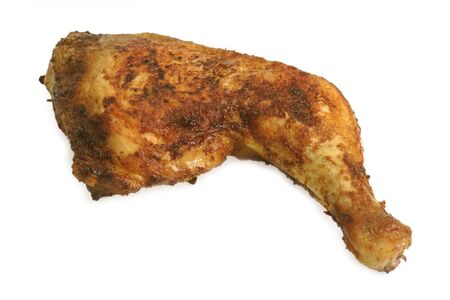 Roasted chicken leg on bright backgroundの写真素材