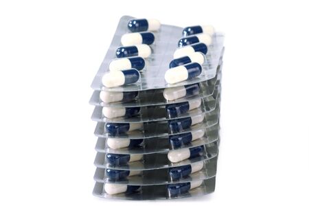 Pills on a bright background. Shot in studio.