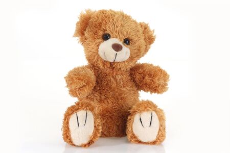 Cute teddy bear on bright backgroundの写真素材