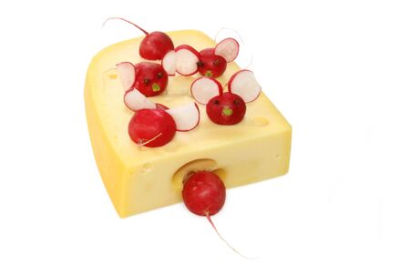 Fresh garnished radish with piece of cheeseの写真素材