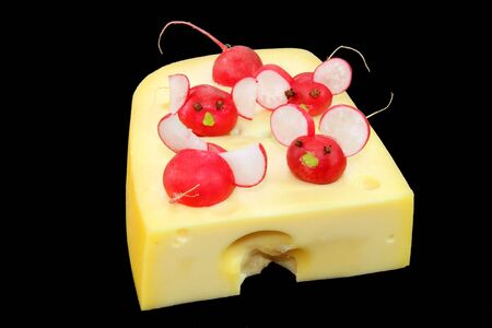 Fresh garnished radish with piece of cheeseの写真素材