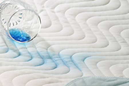 Protection bed layer with a glass and blue fluidの写真素材
