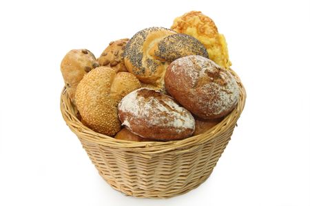 Bread basket with delicious bread rolls on white backgroundの写真素材