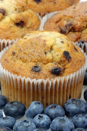 Muffins with blueberries on bright backgroundの写真素材