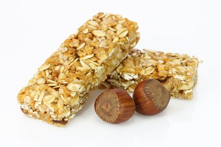 Two cereal bars on a bright backgroundの写真素材