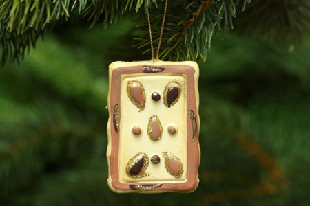 Christmas tree decoration on green backgroundの写真素材