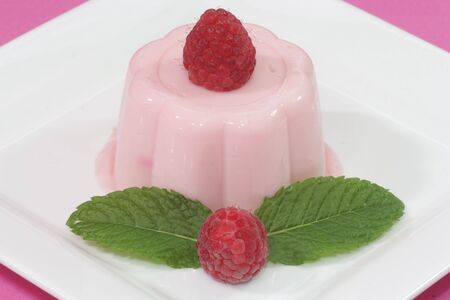 Delicious raspberry custard with fresh fruits in detail-の写真素材