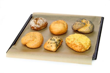 Fresh delicious bread rolls on white backgroundの写真素材