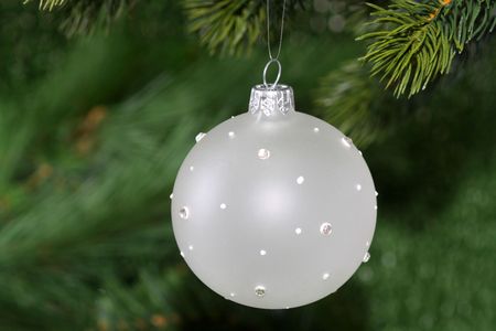 Christmas tree decoration on green backgroundの写真素材