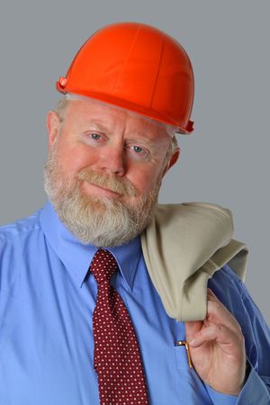 Architect with blueprints and hard hat on grey background
の写真素材