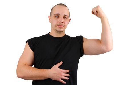 Young caucasian men shows biceps isolated on white backgroundの写真素材