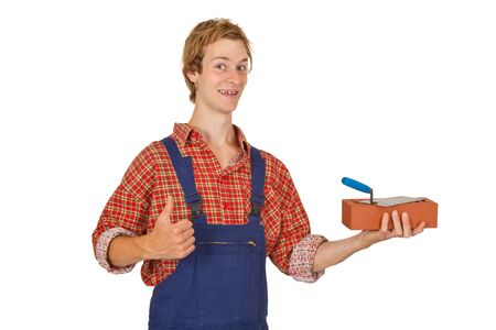 Mason with brick and trowel isolated on white backgroundの写真素材