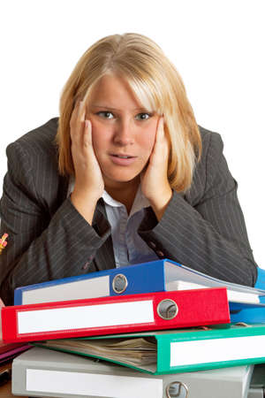 Young stressed businesswoman in office isolated on white backgroundの写真素材