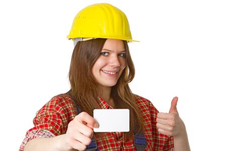 Young friendly craftswoman with businesscard  isolated on white backgroundの写真素材
