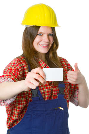 Young friendly craftswoman with businesscard  isolated on white backgroundの写真素材