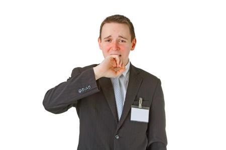Tired young businessman yawning isolated on white