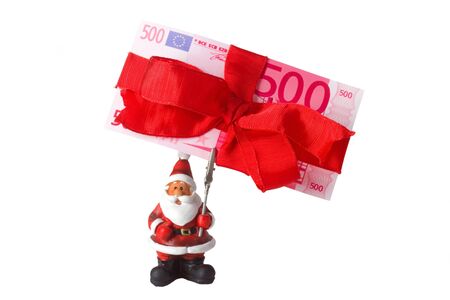 Santa Clause paper holder with five hundred Euro banknote の写真素材