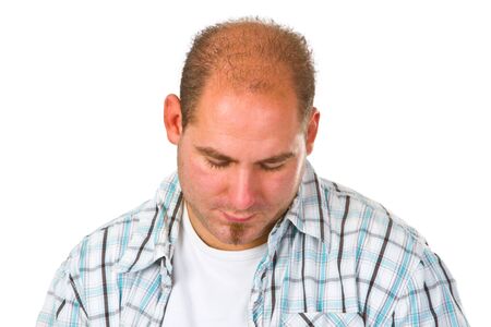Sad young man isolated on white background
