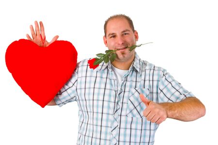 Young man with velvet heart and red rose - isolated on white backgroundの写真素材