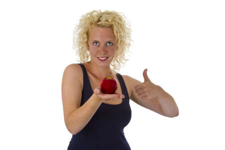 Beautiful blond woman holding red apple - isolated on white backgroundの写真素材