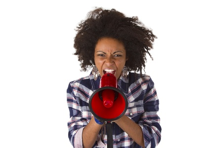 Young african american yelling at her megaphone isolated on white backgroundの写真素材