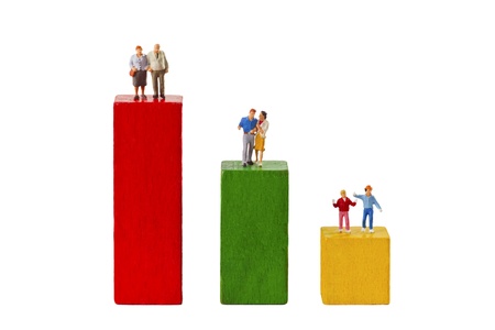 Standing figurines and Toy Bricks isolated on white backgroundの写真素材